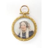 A VICTORIAN DOUBLE-SIDED LOCKET the foliate chased and engraved frame is set with two hand painted