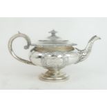 A GEORGE IV SCOTTISH SILVER TEAPOT by J Hay, Edinburgh 1820, of squat circular form, with an