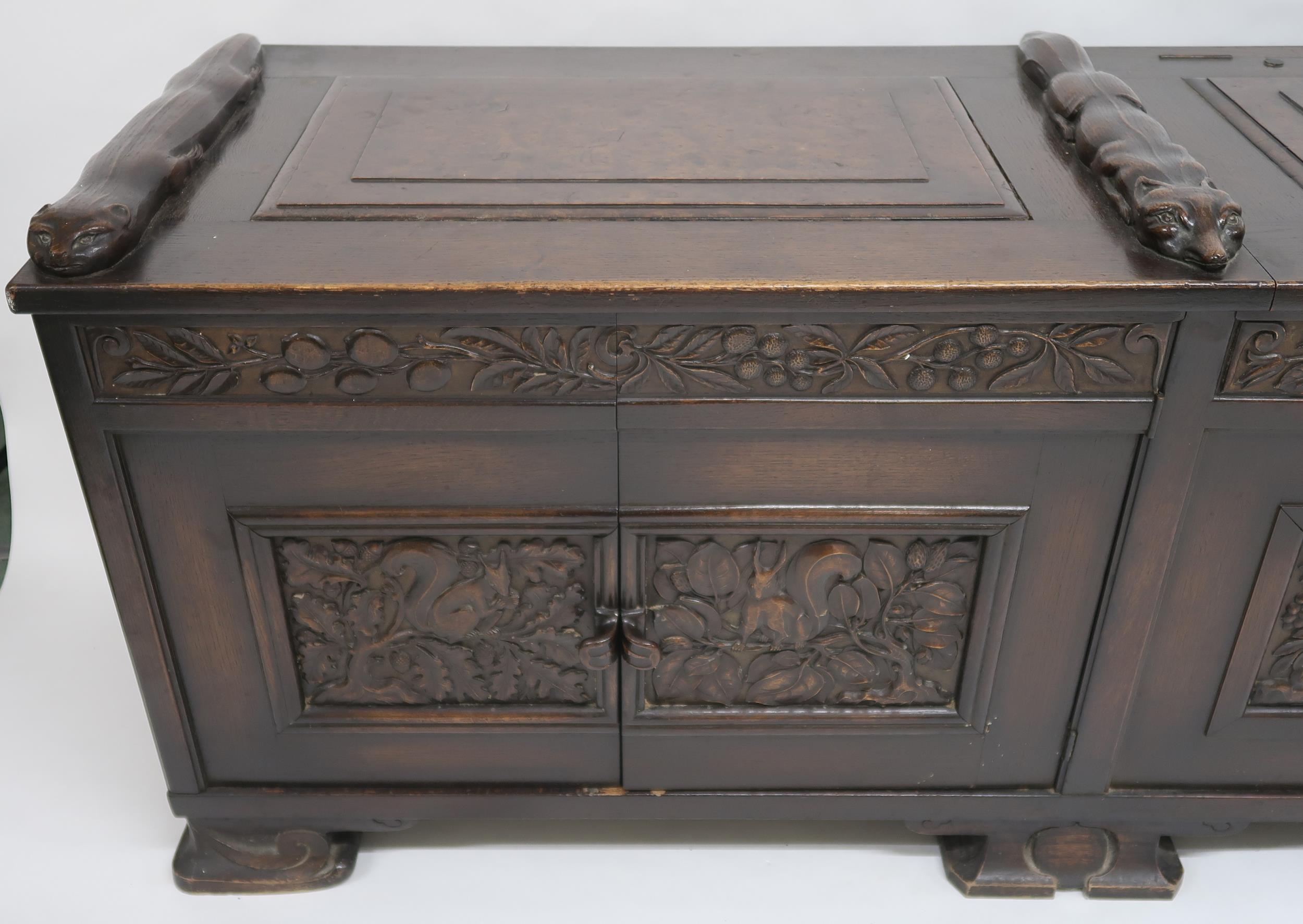 AN ARTS AND CRAFTS OAK AND BURR WALNUT COFFER the three section hinged top carved with foxes and - Image 2 of 16