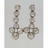 A PAIR OF DIAMOND DROP EARRINGS set with estimated approx 6.50cts of old cut diamonds across the