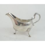 A GEORGE III HEAVY GAUGE IRISH SILVER SAUCE BOAT maker's mark rubbed, Dublin, with a beaded rim,