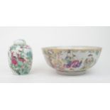 A CHINESE FAMILLE ROSE PUNCH BOWL  painted with figures within scrolling panels and diaper, 26cm