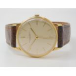 AN INTERNATIONAL WATCH CO GENTS WATCH the 18ct gold case with Swiss hallmarks has a cream dial