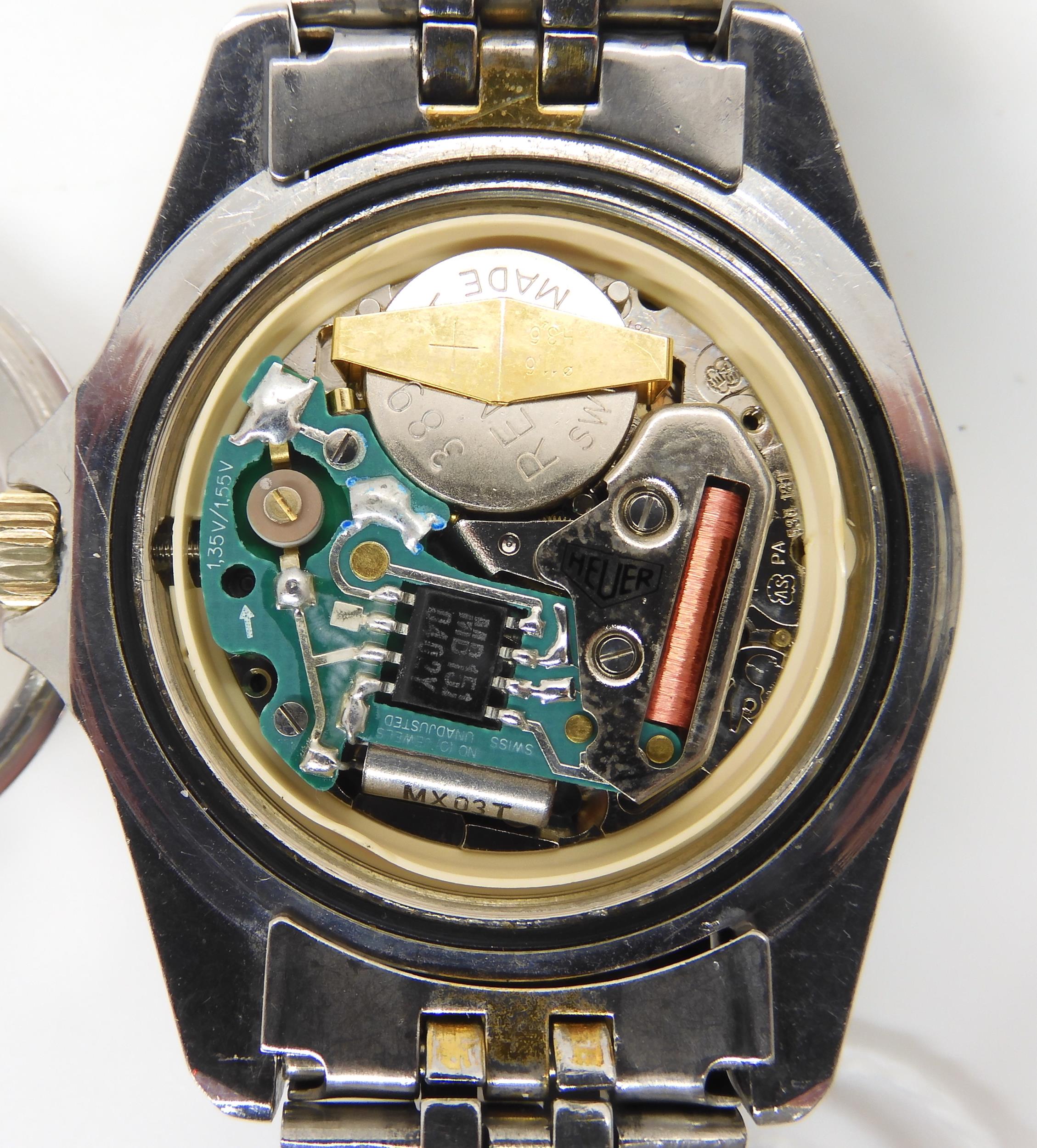 A VINTAGE HEUER WRISTWATCH circa 1983, steel and gold plate diver's watch.  The watch has a black - Image 11 of 11