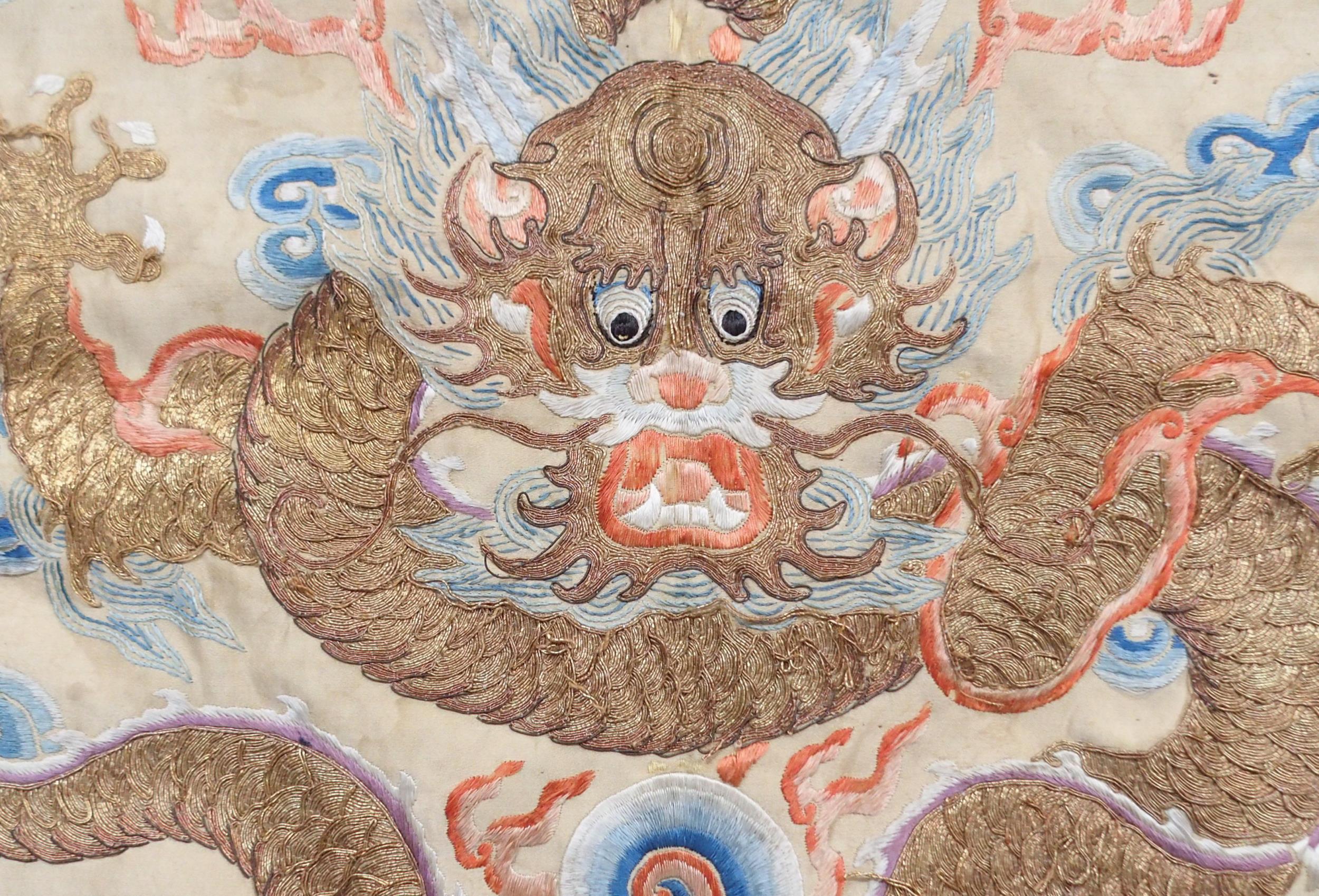 A CHINESE SILK PANEL decorated in coloured threads on a cream ground within a blue and white - Image 6 of 27