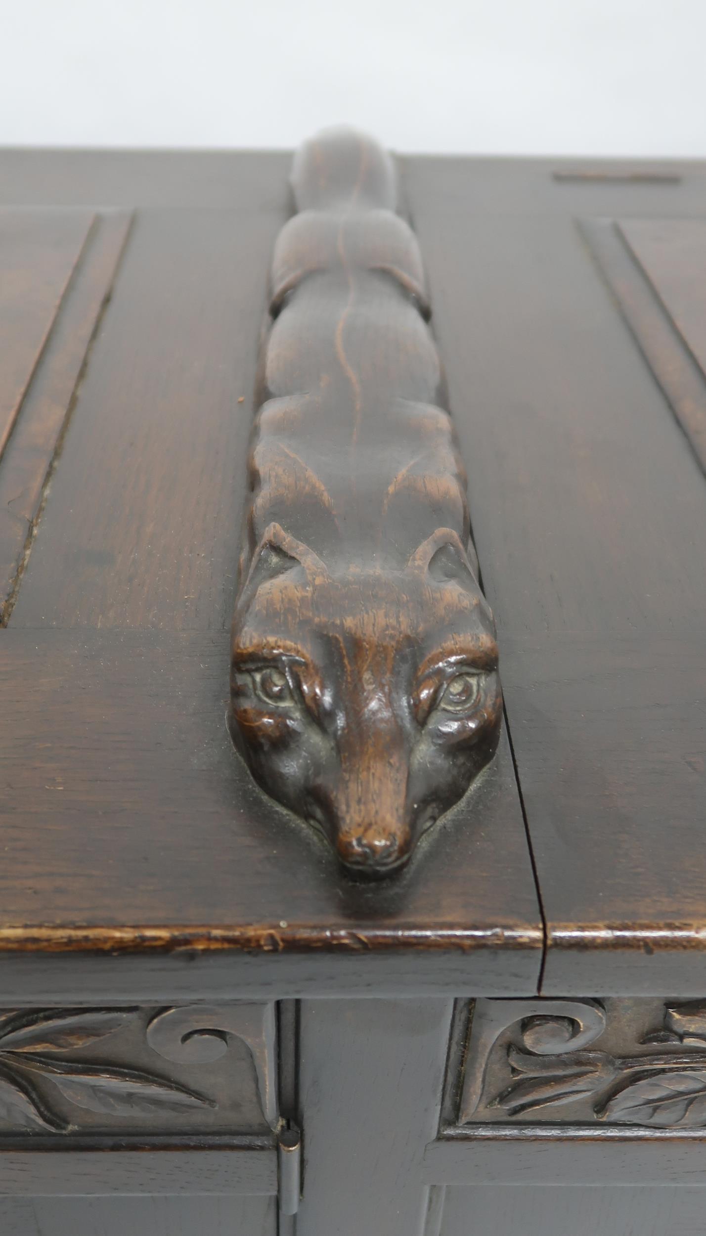 AN ARTS AND CRAFTS OAK AND BURR WALNUT COFFER the three section hinged top carved with foxes and - Image 4 of 16