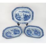 A SET OF THREE CHINESE EXPORT BLUE AND WHITE OCTAGONAL PLATTERS the platters depicting pagodas