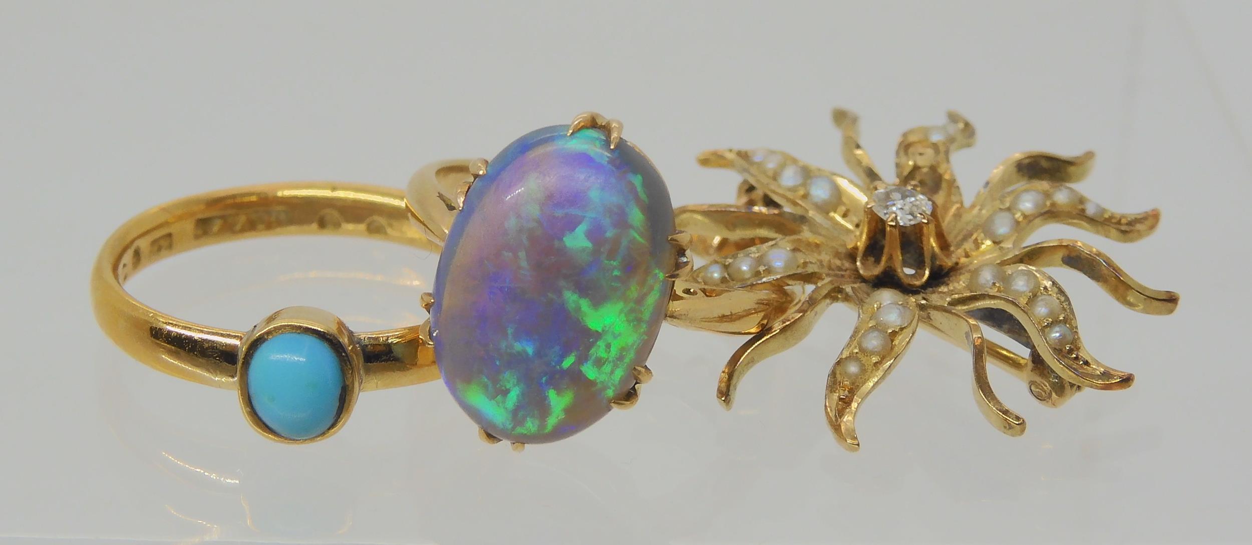 AN OPAL RING AND OTHER ITEMS The solid black opal has lively green, purple and blue colour play, and - Image 8 of 15