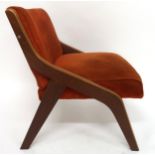 A MID 20TH CENTURY NEIL MORRIS FOR MORRIS OF GLASGOW LOUNGE CHAIR with a laminated Formosa Teak