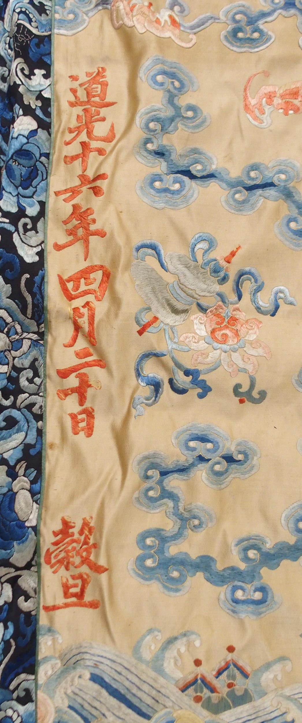 A CHINESE SILK PANEL decorated in coloured threads on a cream ground within a blue and white - Image 3 of 27