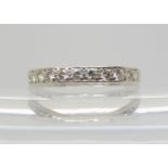 A WHITE METAL FULL DIAMOND ETERNITY RING set with estimated approx 1.30cts of brilliant cut