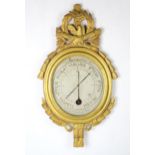 A FRENCH LATE 18TH CENTURY LOUIS XVI GILTWOOD-FRAMED BAROMETER/THERMOMETER BY A. GIZOR Surmounted by