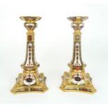 A PAIR OF ROYAL CROWN DERBY CANDLESTICKS in 1128 pattern, 27cm high Condition Report:first