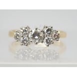 AN 18CT GOLD DIAMOND CLUSTER RING set with estimated approx 0.60cts of brilliant cut diamonds,