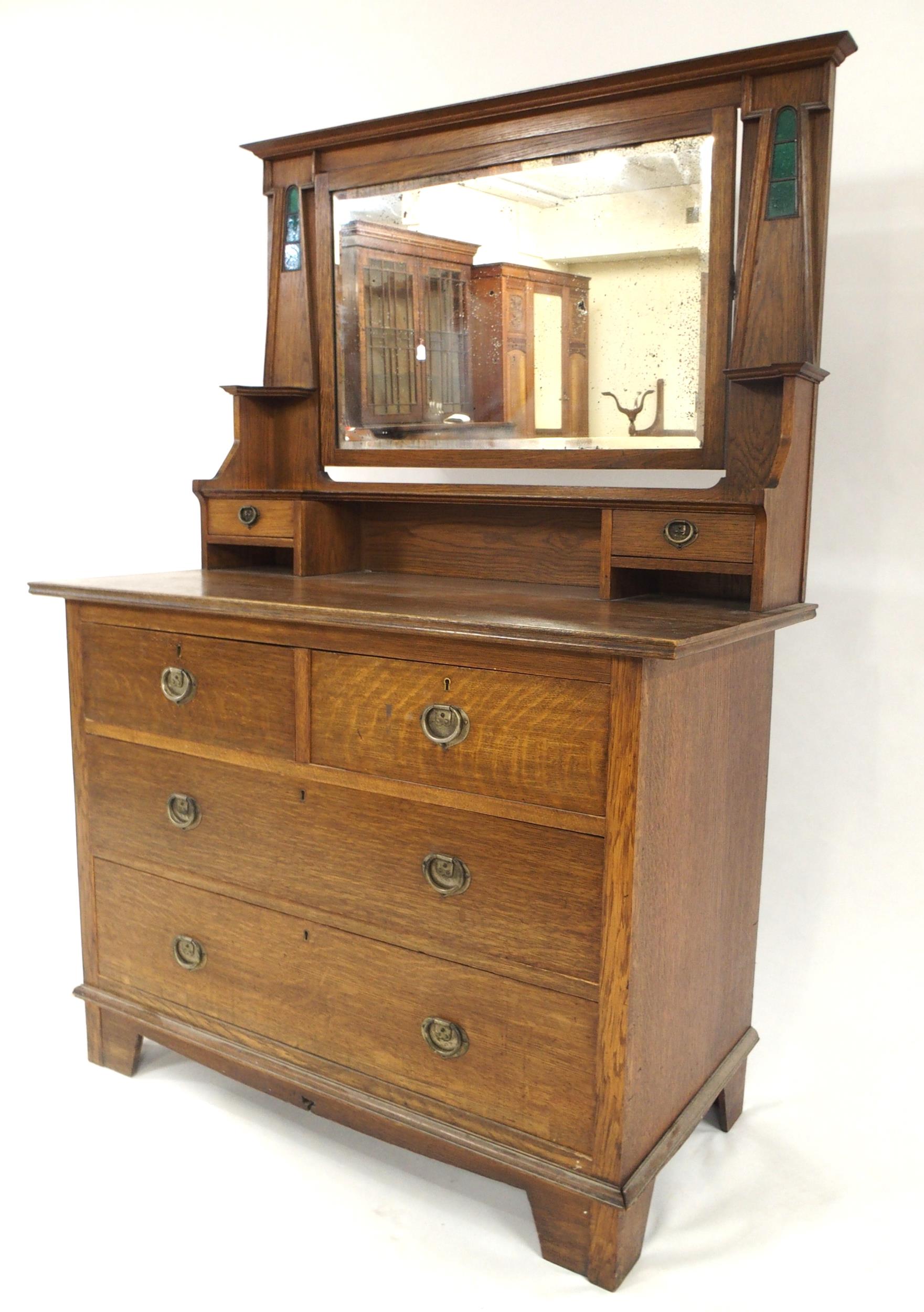 A HARRIS LEBUS ARTS & CRAFTS TWO PIECE BEDROOM SUITE comprising wardrobe with shaped cornice over - Image 27 of 29