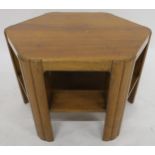 AN EARLY 20TH CENTURY HEAL & SON LONDON HEXAGONAL BOOK TABLE with mahogany hexagonal top on shaped