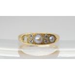 A PEARL & DIAMOND RING mounted throughout in 18ct yellow gold with Chester hallmarks for 1905,