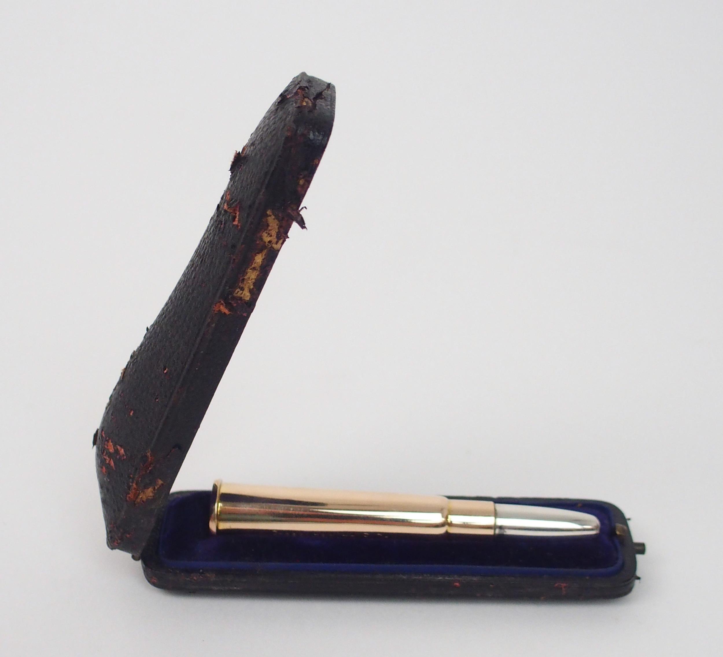 A "GOLDEN BULLET" With white metal bullet tip and yellow metal body, hand-engraved Presented to B. - Image 4 of 5