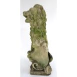A 19TH CENTURY SCOTTISH CARVED STONE HERALDIC LION GATE FINIAL with seated lion bearing a blank