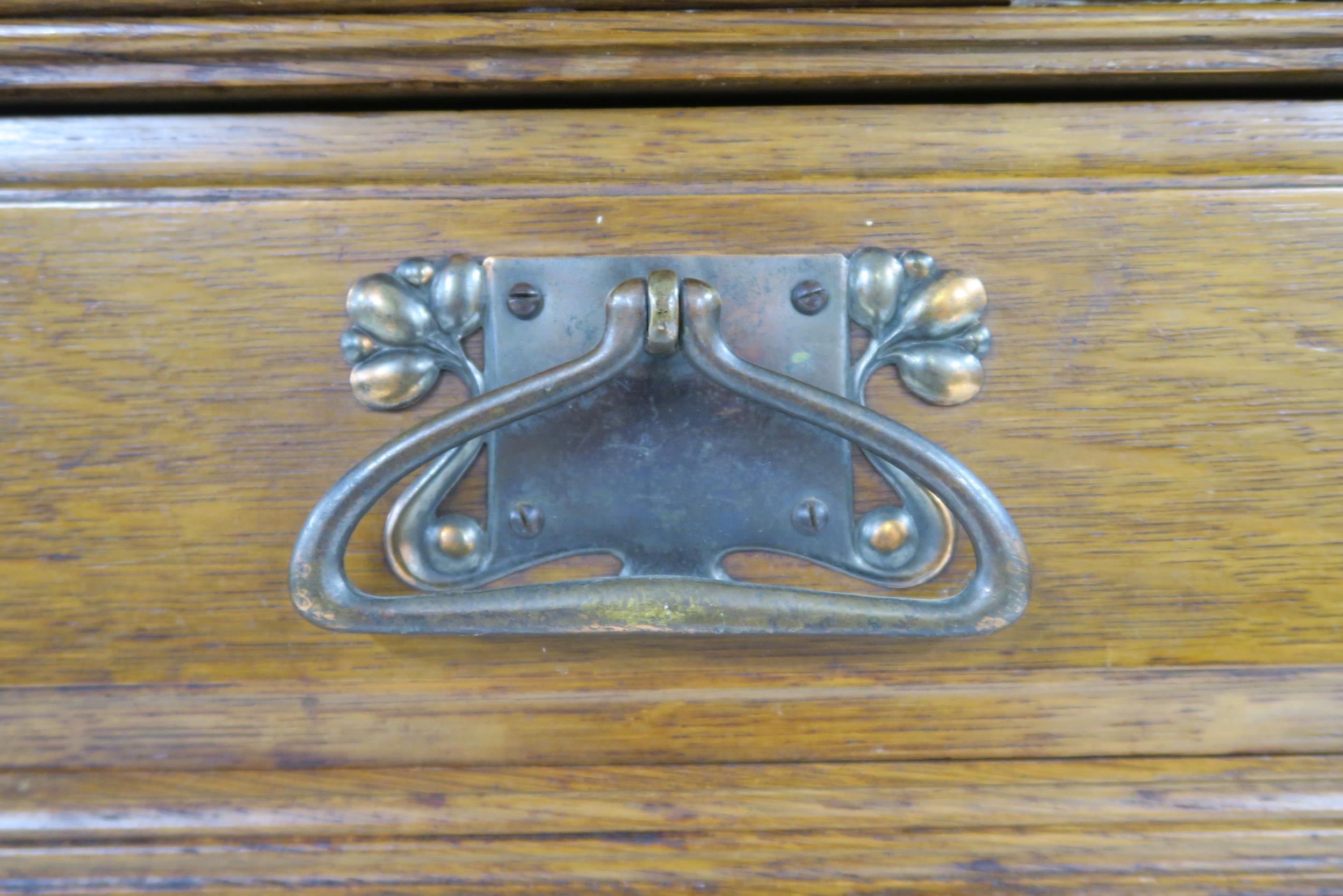 A LATE VICTORIAN OAK ARTS & CRAFTS BOOKCASE with moulded cornice over three glazed doors over two - Image 3 of 9