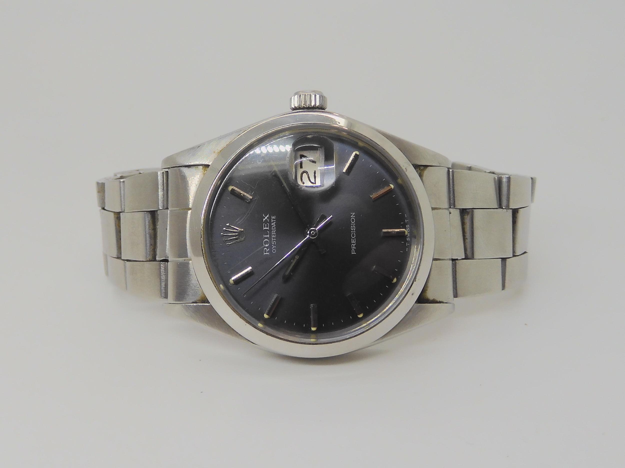A ROLEX OYSTERDATE PRECISION with dark grey satined dial, silver coloured baton numerals, hands, and - Image 9 of 14