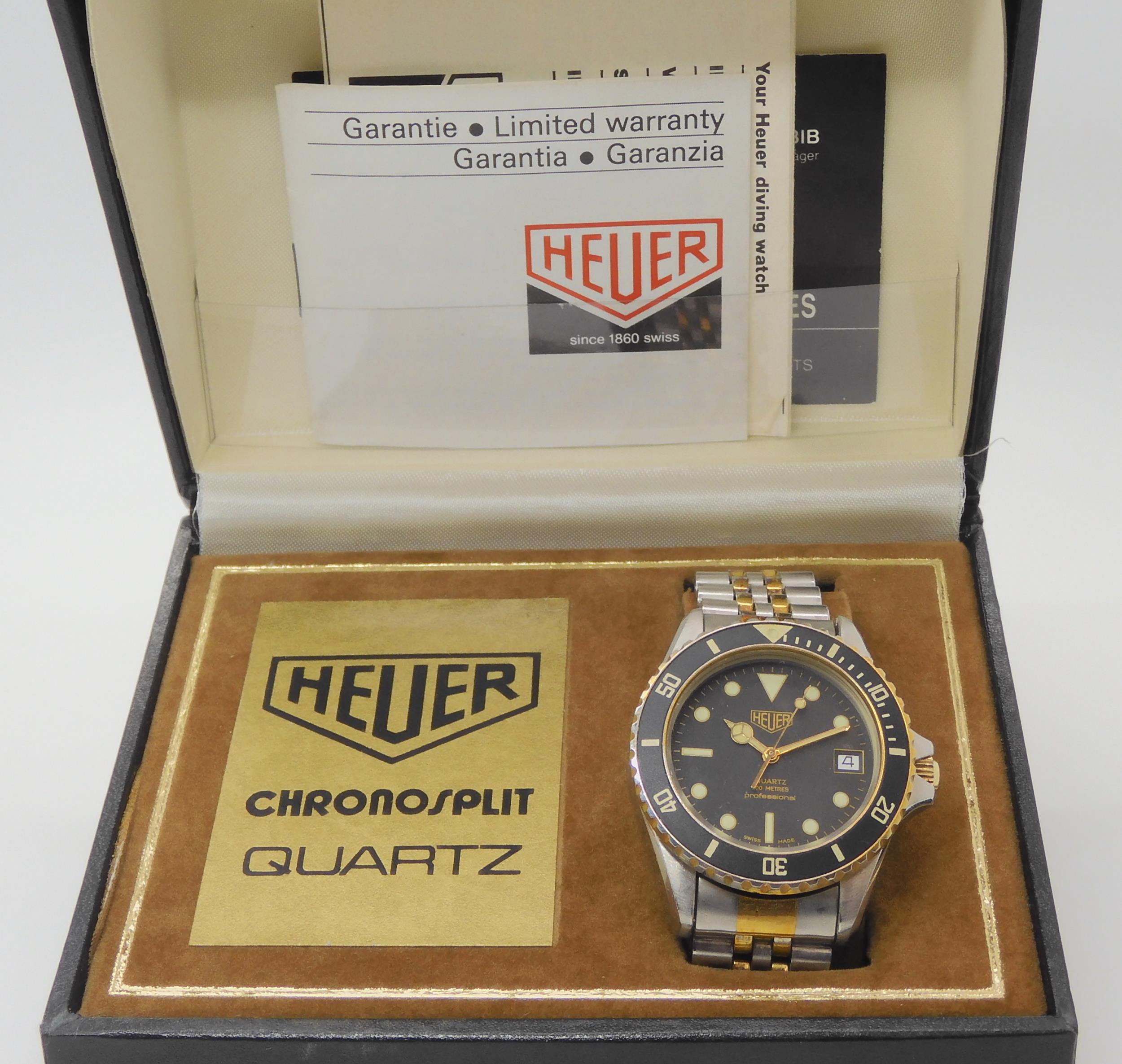 A VINTAGE HEUER WRISTWATCH circa 1983, steel and gold plate diver's watch.  The watch has a black - Image 9 of 11