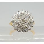A SUBSTANTIAL DIAMOND CLUSTER RING set with estimated approx 1ct of brilliant cut diamonds, finger