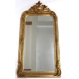 A 20TH CENTURY GILT FRAMED LOUIS PHILIPPE STYLE WALL MIRROR with scrolled foliate and fruit