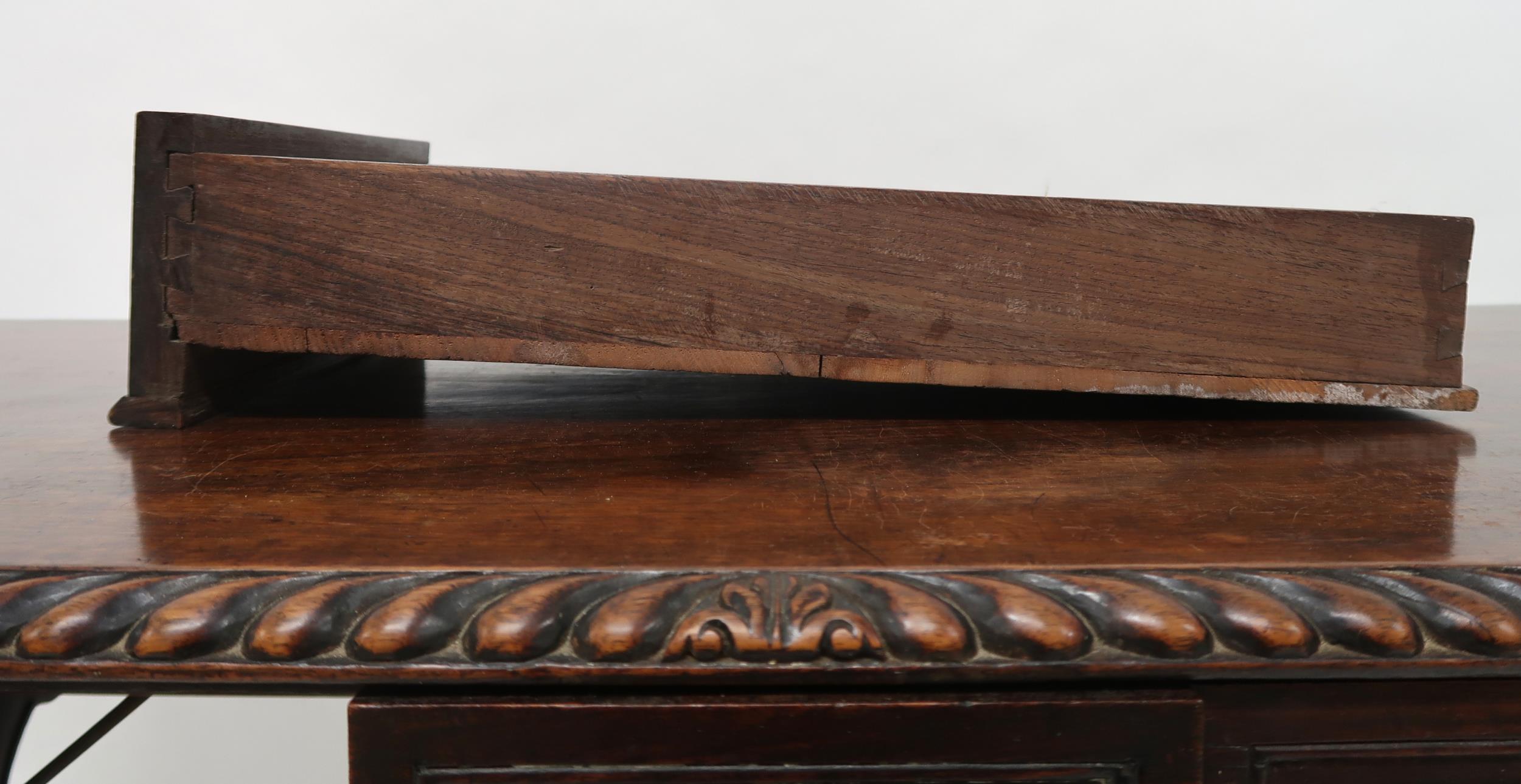 AN ANGLO-INDIAN ROSEWOOD LIBRARY TABLE with rectangular gadrooned top over a pair of asymmetrical - Image 9 of 13