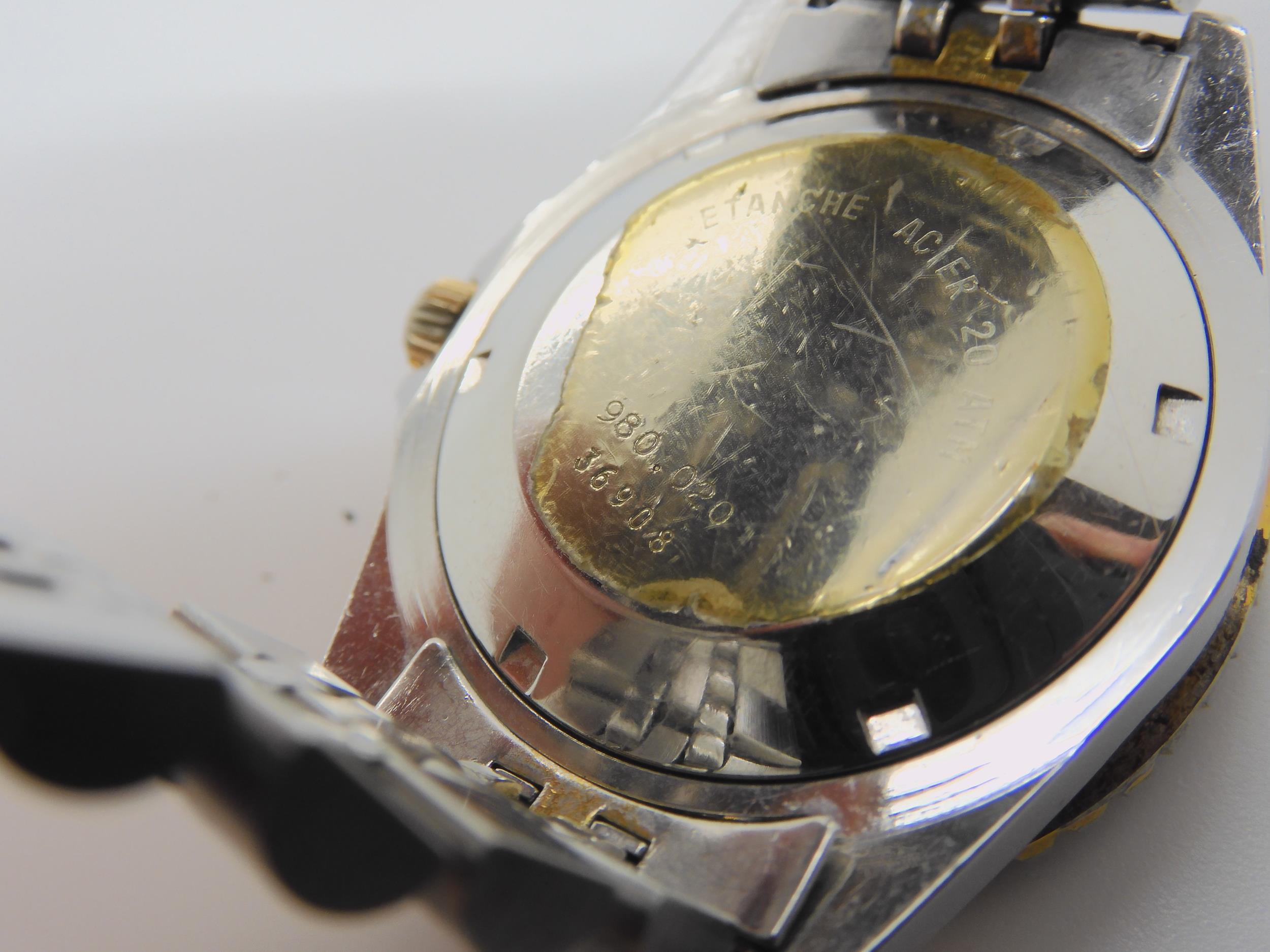 A VINTAGE HEUER WRISTWATCH circa 1983, steel and gold plate diver's watch.  The watch has a black - Image 7 of 11