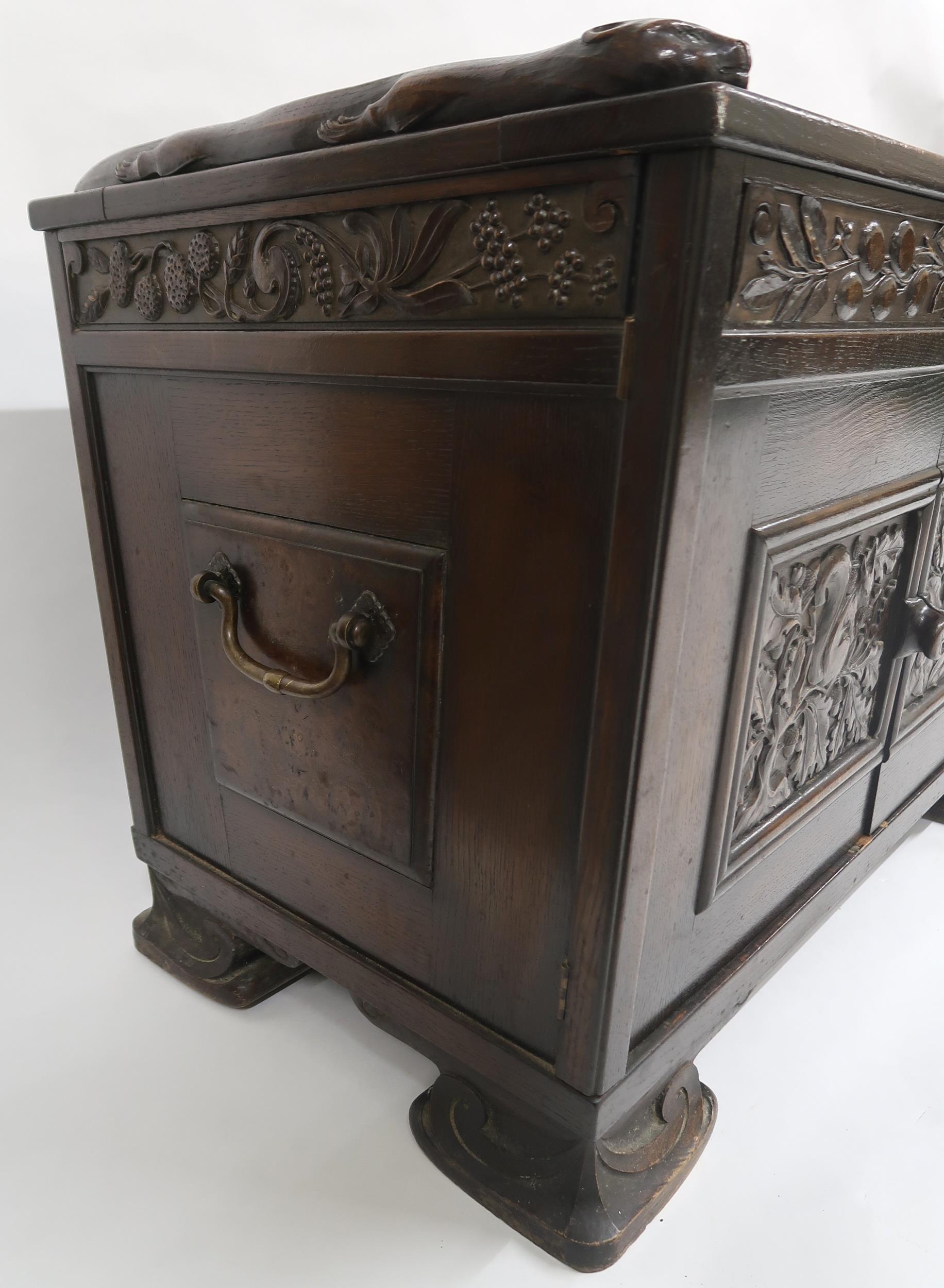 AN ARTS AND CRAFTS OAK AND BURR WALNUT COFFER the three section hinged top carved with foxes and - Image 14 of 16