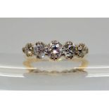 AN 18CT GOLD FIVE STONE DIAMOND RING set with estimated approx 1.50cts of brilliant cuts. Finger