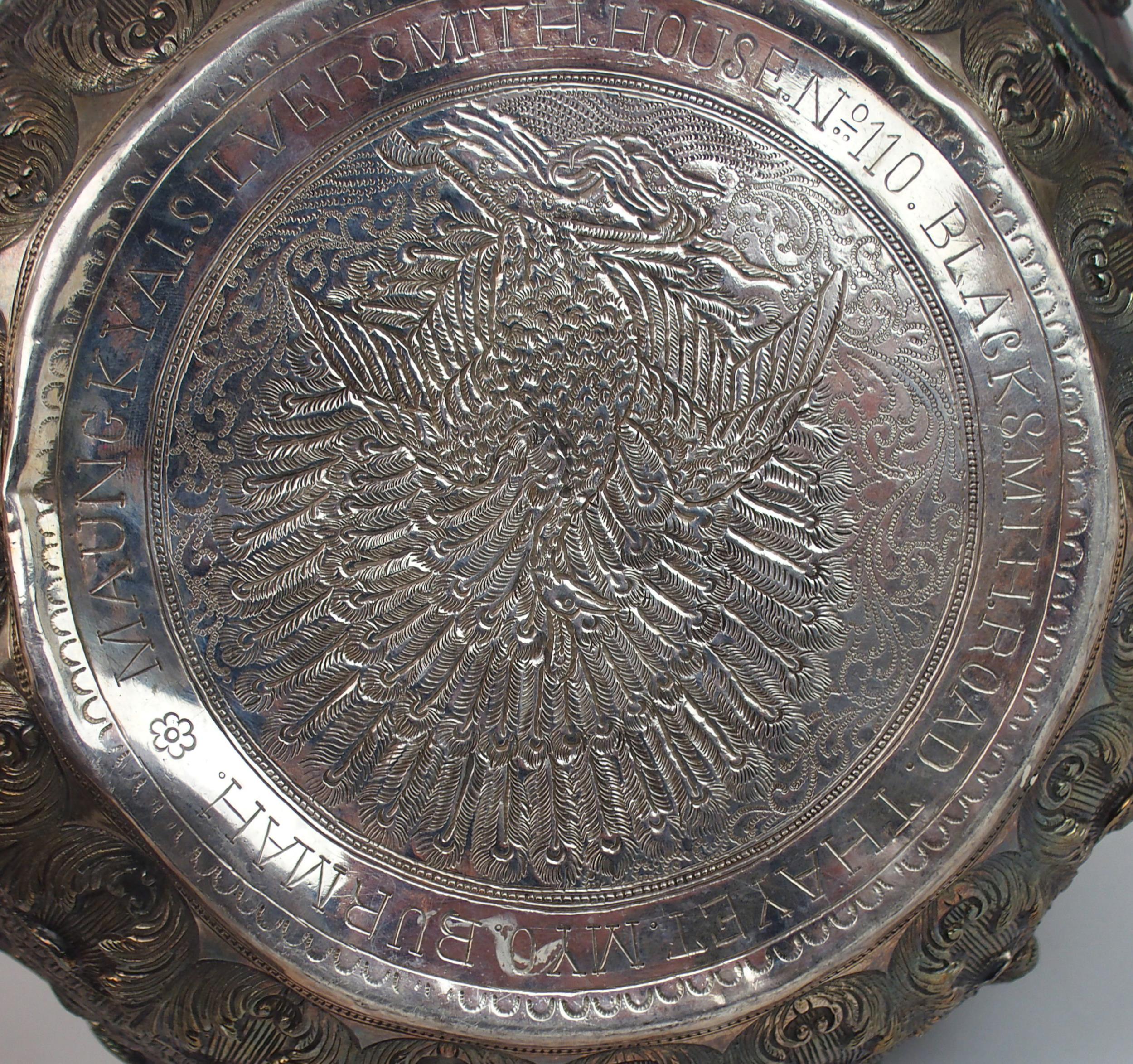 A BURMESE SILVER BOWL of rounded form, with profusely embossed and repousse work of villagers, - Image 9 of 13