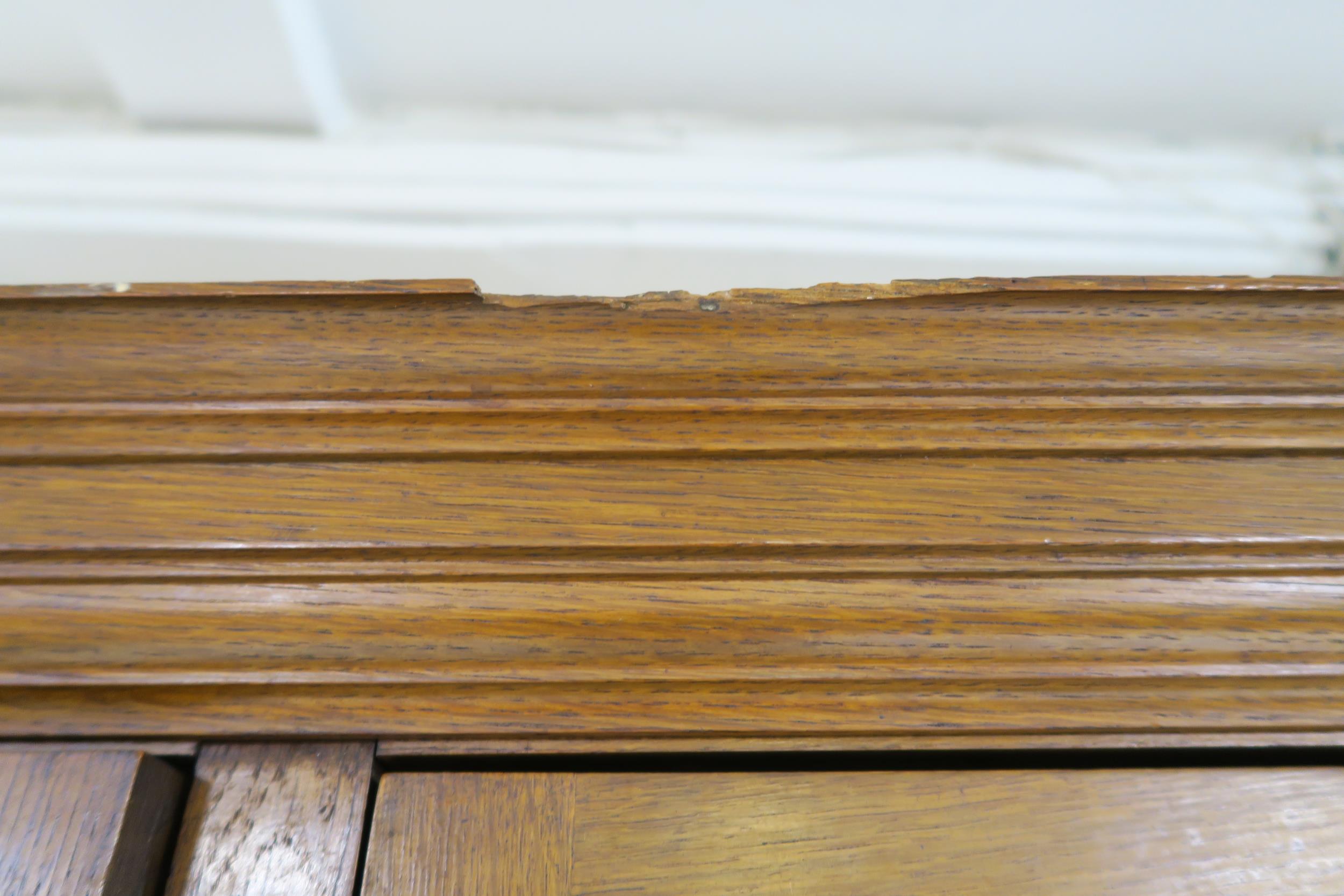 A LATE VICTORIAN OAK ARTS & CRAFTS BOOKCASE with moulded cornice over three glazed doors over two - Image 6 of 9