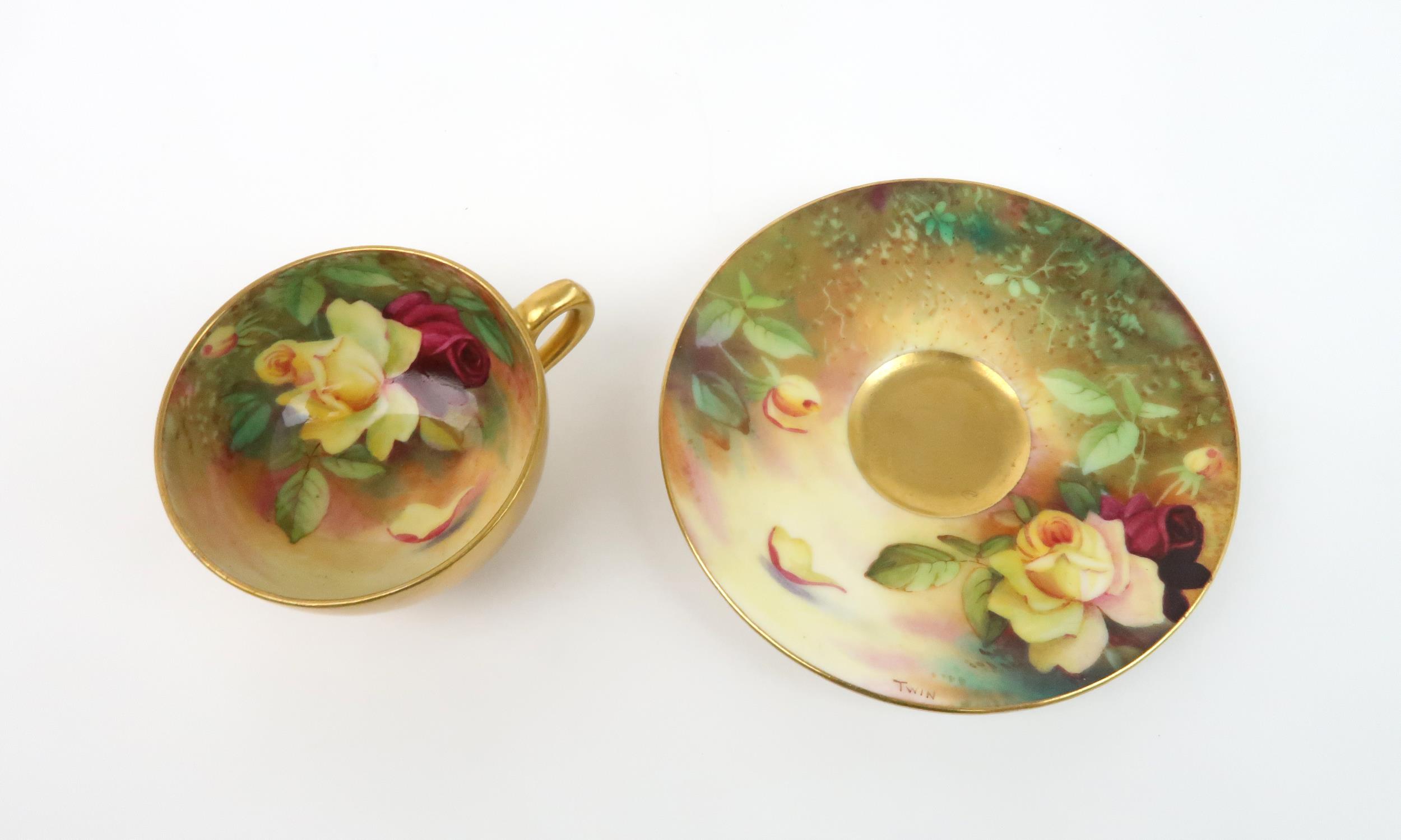 A ROYAL WORCESTER BOXED SET OF SIX DEMITASSE COFFEE CUPS AND SAUCERS each painted with roses in a - Image 3 of 8