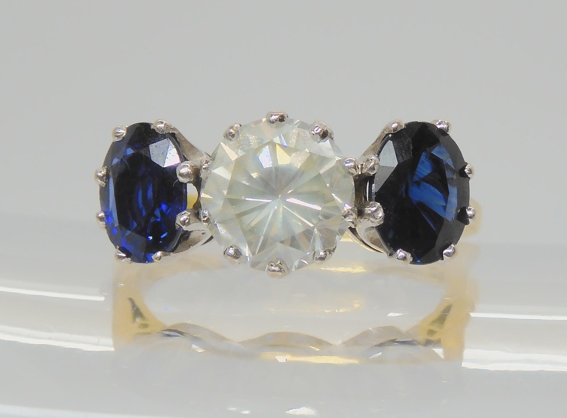 A SUBSTANTIAL SAPPHIRE AND DIAMOND RING set in a 18ct yellow and white gold classic crown setting