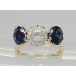 A SUBSTANTIAL SAPPHIRE AND DIAMOND RING set in a 18ct yellow and white gold classic crown setting