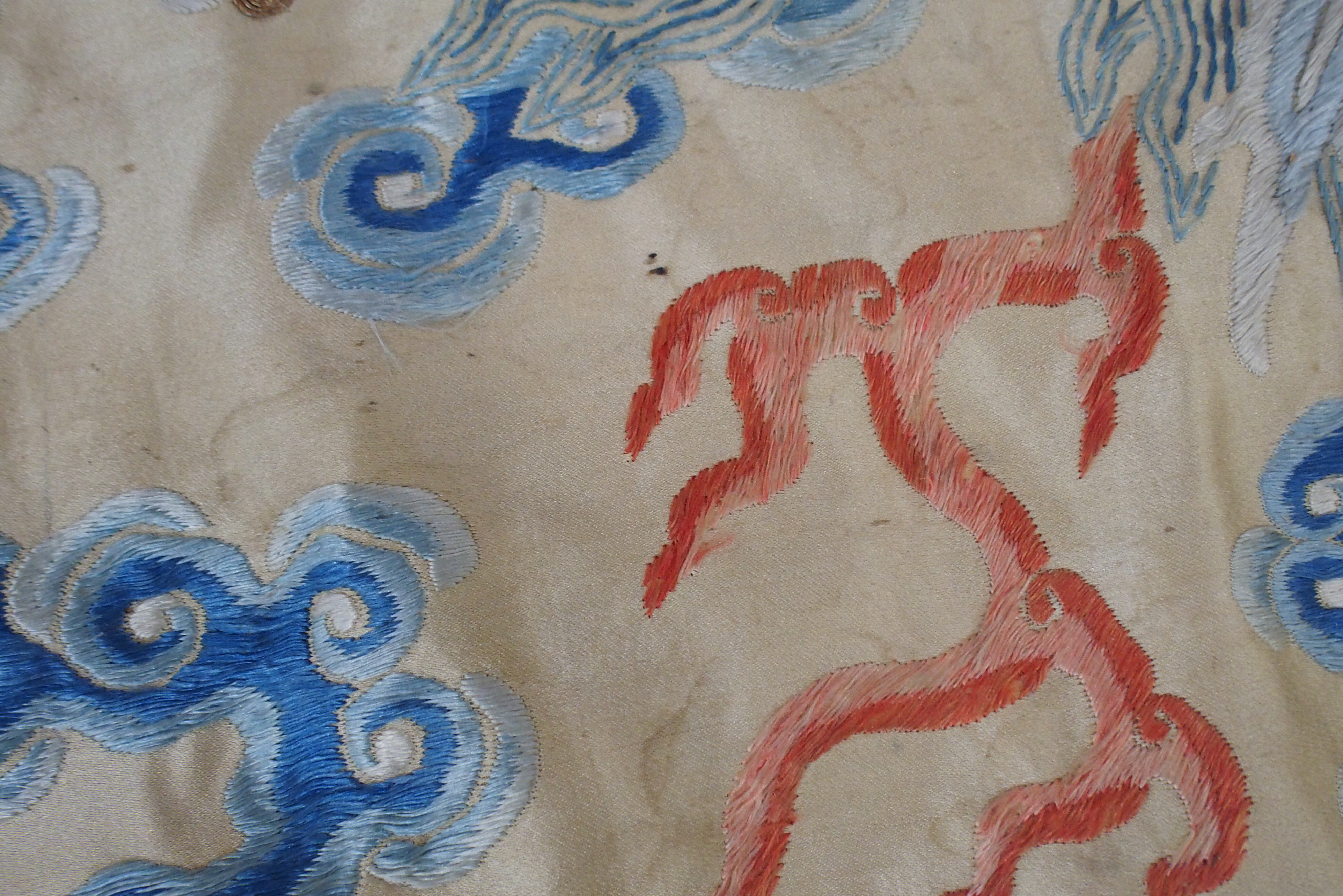 A CHINESE SILK PANEL decorated in coloured threads on a cream ground within a blue and white - Image 25 of 27