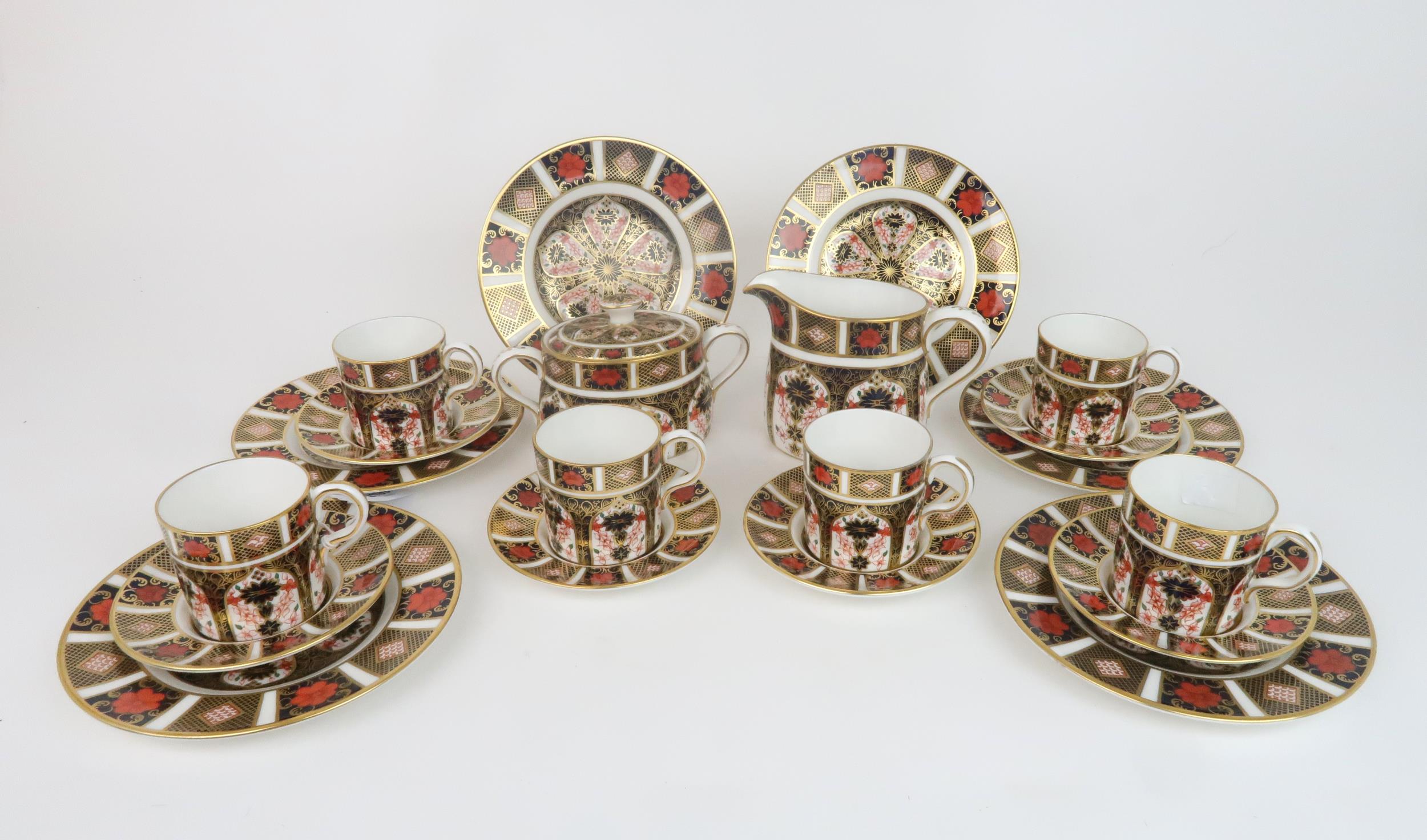 A SET OF SIX ROYAL CROWN DERBY COFFEE CANS AND SAUCERS with six matching plates, milk jug and lidded