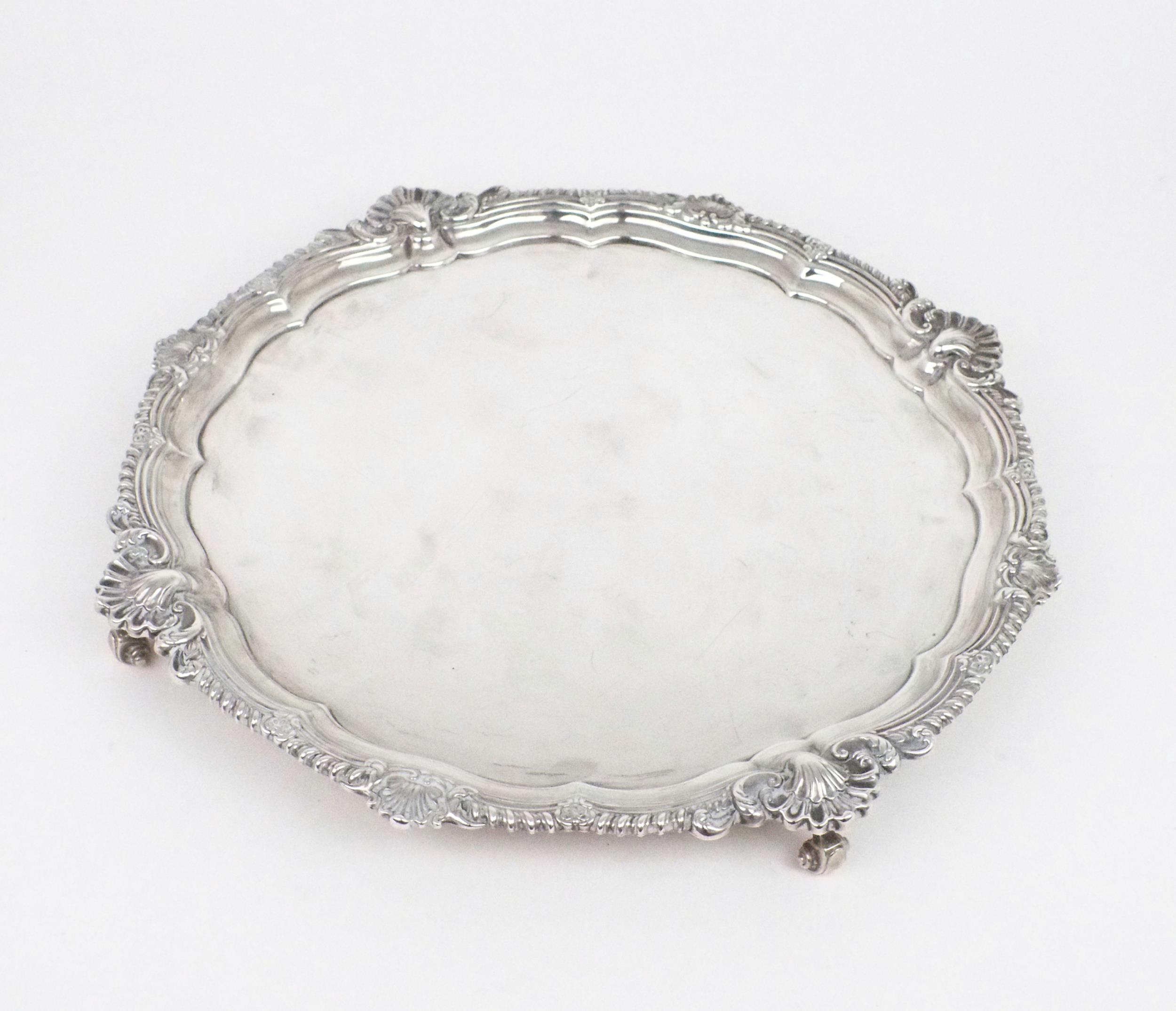 AN EDWARDIAN SILVER SALVER by Harrison Brothers & Howson, London 1903, of plain form, with a