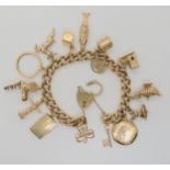 A 9CT GOLD CHARM BRACELET the end links and the heart shaped clasp both hallmarked 9.375 (9ct). With
