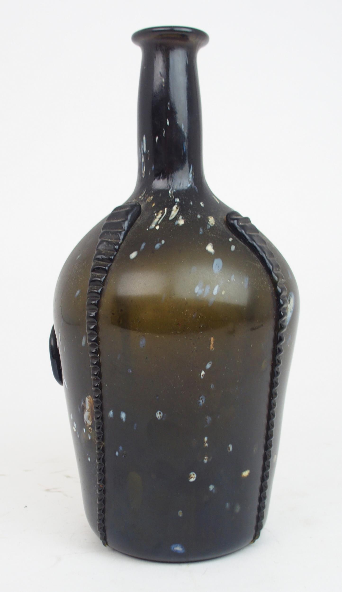 AN EARLY 19TH CENTURY ALLOA GLASS WINE BOTTLE in dark olive green mottled with white splashes, - Image 2 of 7