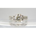 A SUBSTANTIAL DIAMOND DRESS RING set with an estimated approx 2ct diamond set to the centre, with