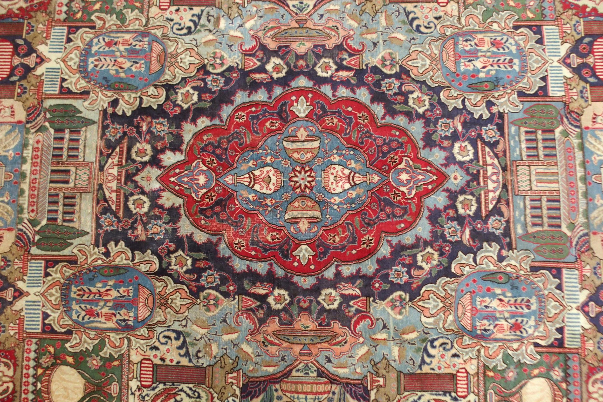 A MULTICOLOURED GROUND KASHMAR RUG with red and blue central medallion upon an extensively decorated - Image 2 of 10