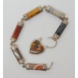A SCOTTISH AGATE BRACELET the octagonal baton links displaying a variety of jaspers and agates,