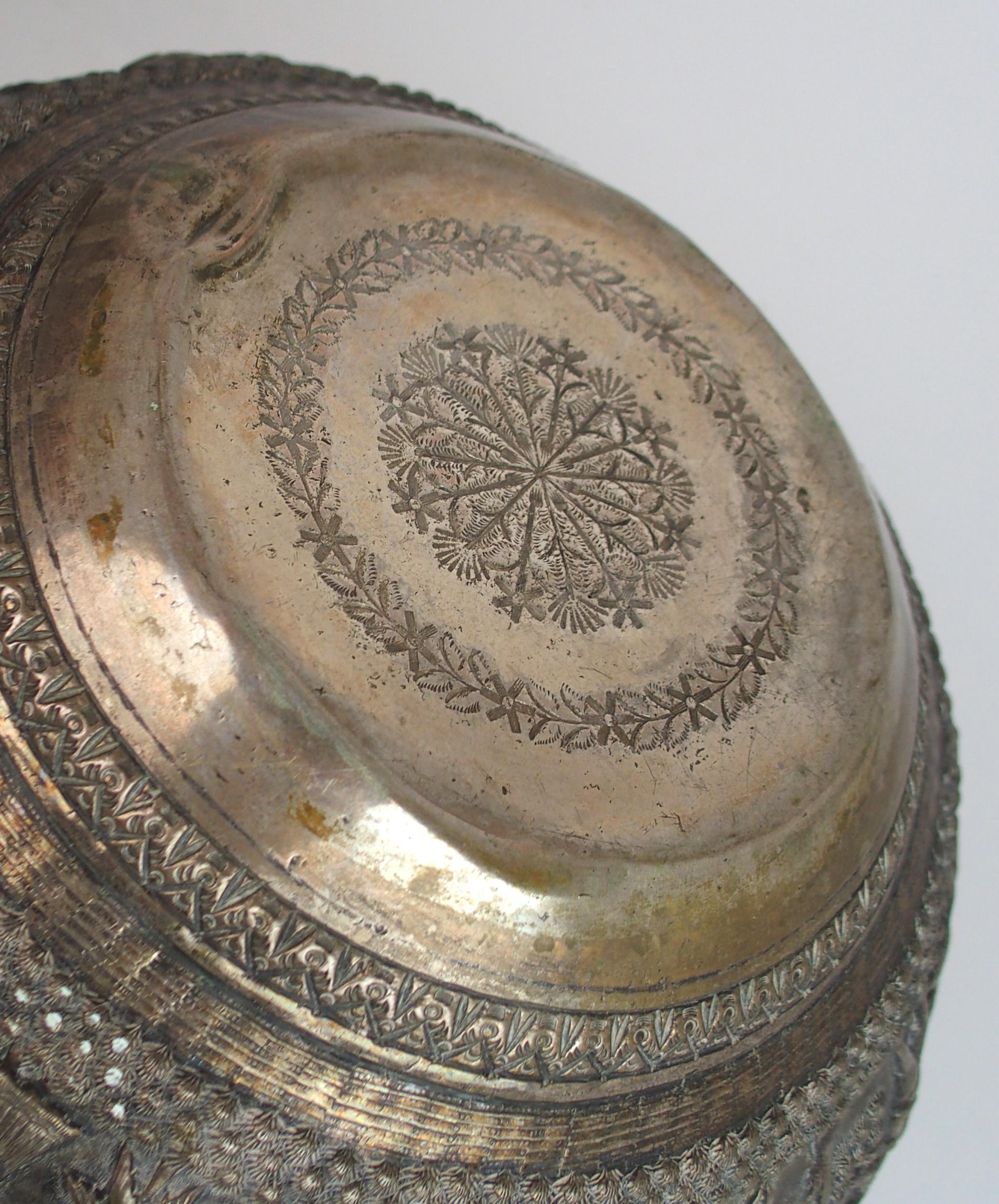 A BURMESE SILVER BOWL of rounded form, with profusely embossed and repousse work of villagers, - Image 13 of 13