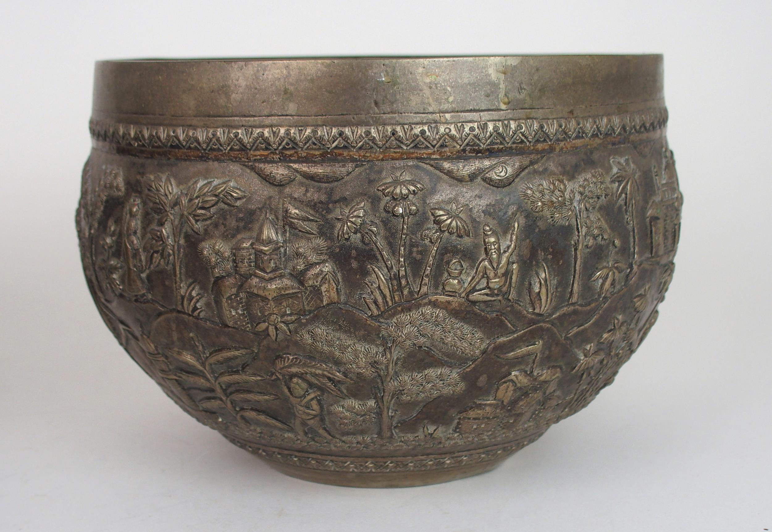 A BURMESE SILVER BOWL of rounded form, with profusely embossed and repousse work of villagers, - Image 11 of 13