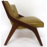 A MID 20TH CENTURY NEIL MORRIS FOR MORRIS OF GLASGOW LOUNGE CHAIR with a laminated Formosa Teak