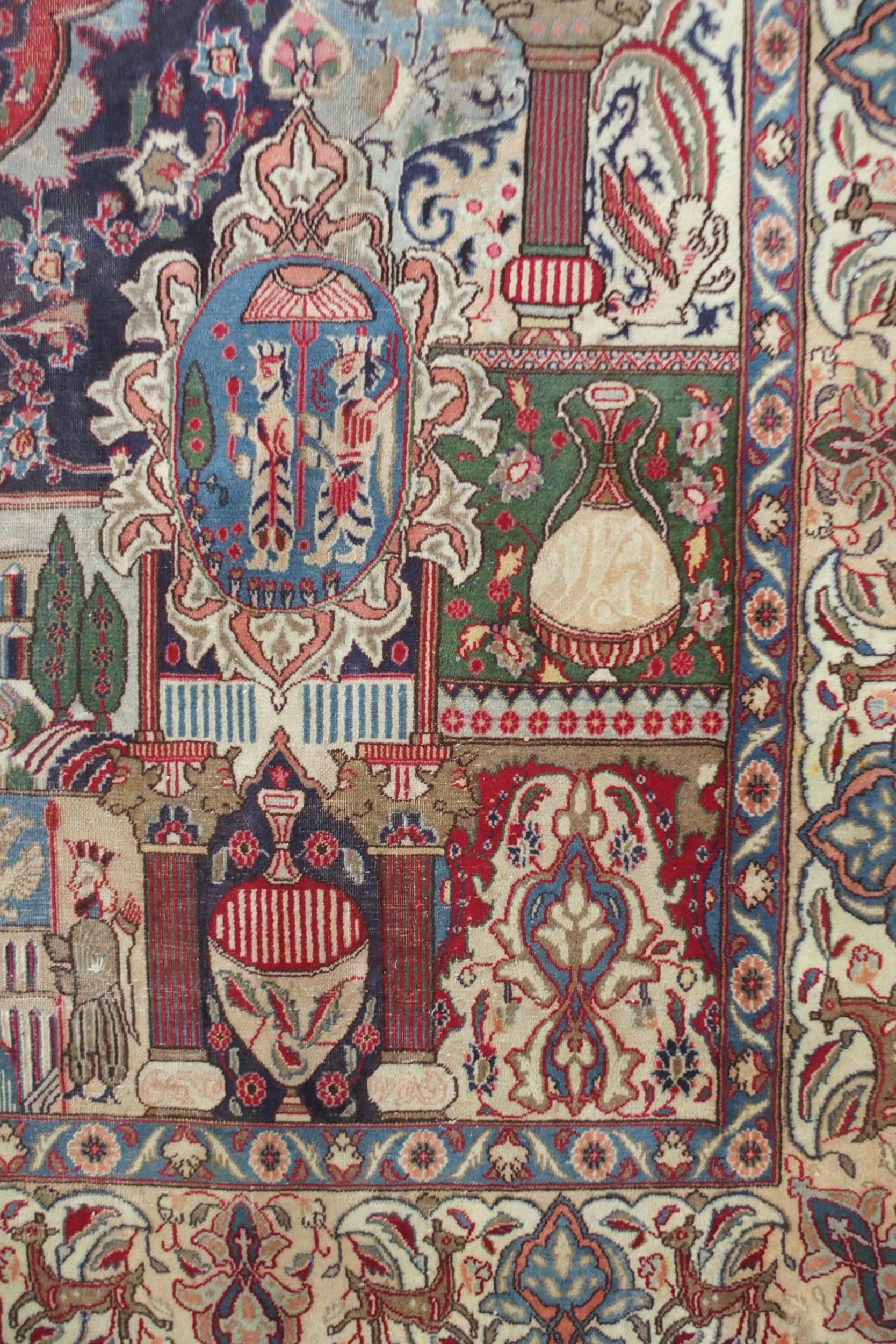 A MULTICOLOURED GROUND KASHMAR RUG with red and blue central medallion upon an extensively decorated - Image 3 of 10