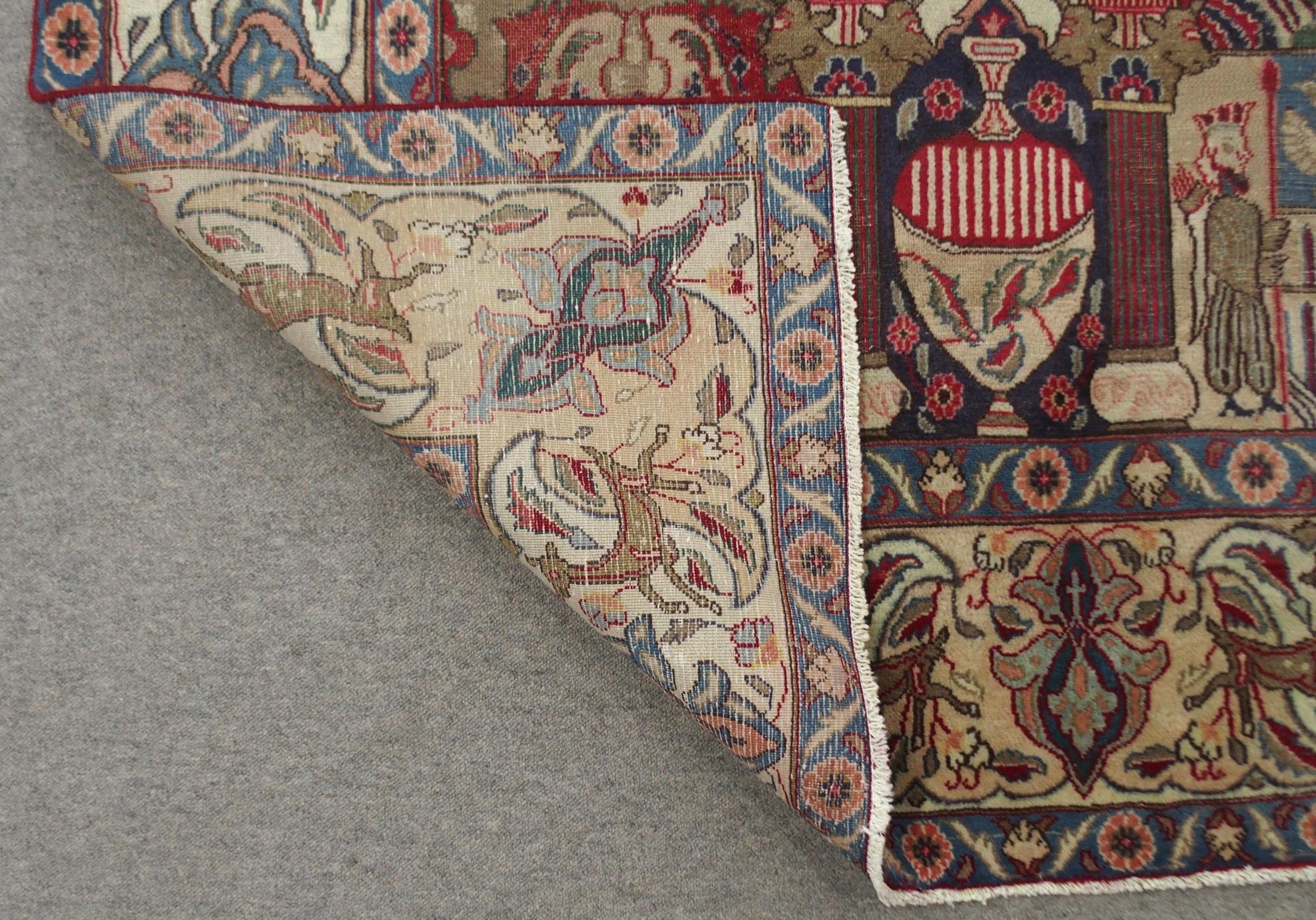 A MULTICOLOURED GROUND KASHMAR RUG with red and blue central medallion upon an extensively decorated - Image 8 of 10